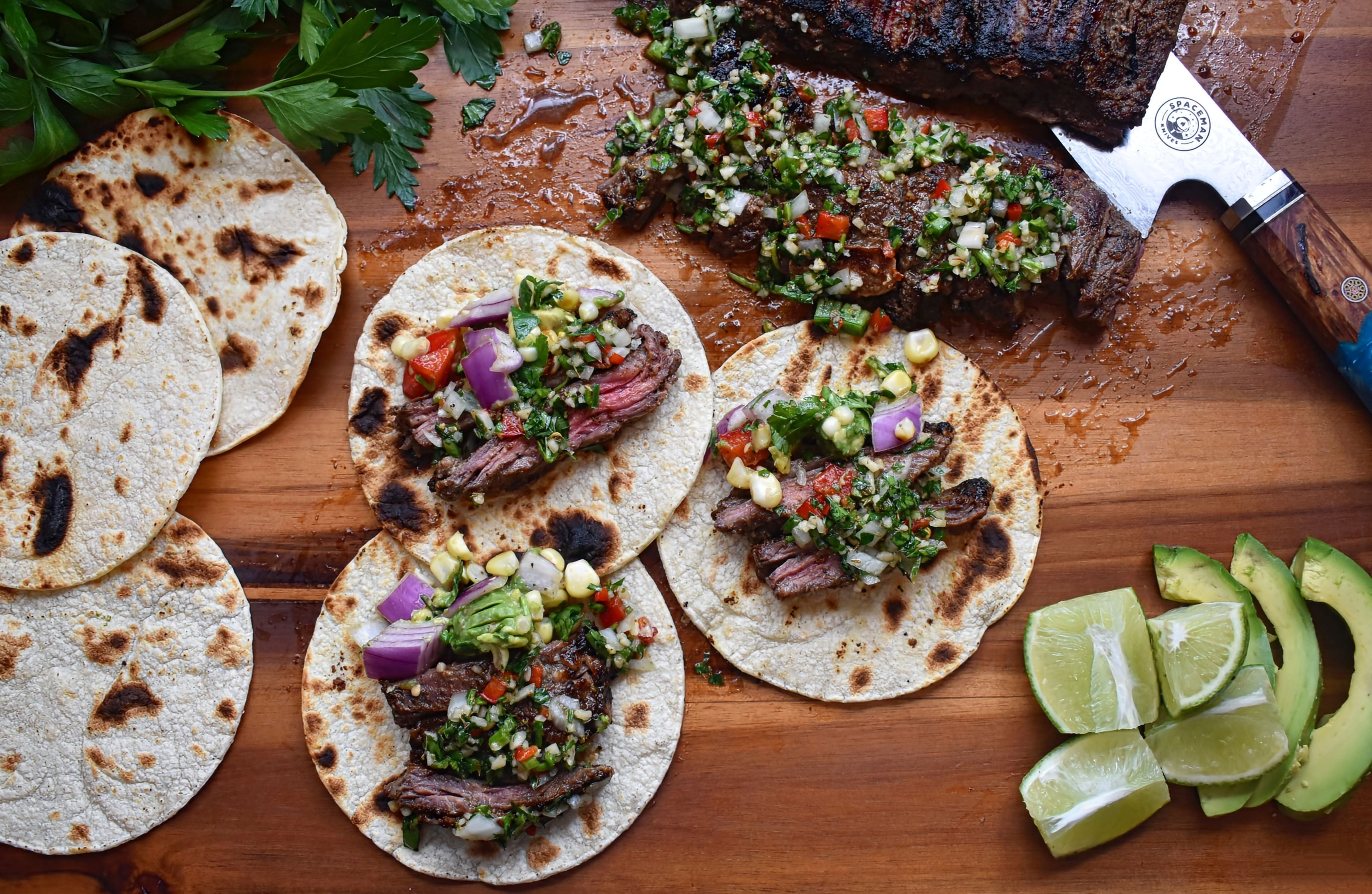 Grilled Skirt Steak Tacos Topped with Chimichurri